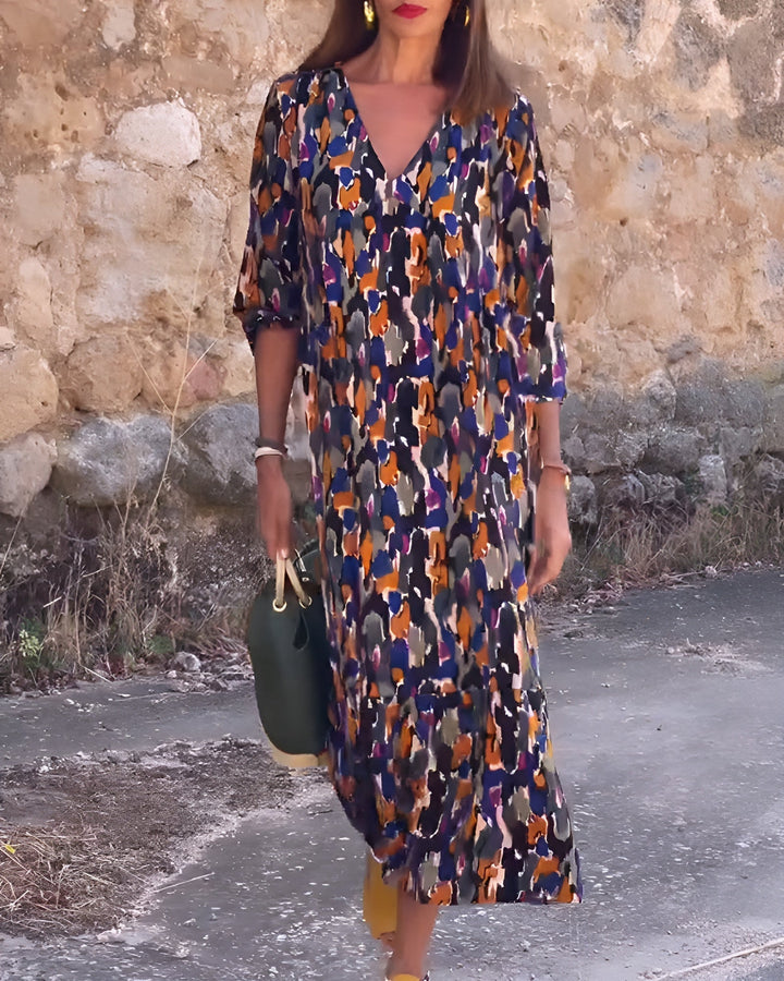 Renée | Vintage jurk met V-hals en romantische mouwen