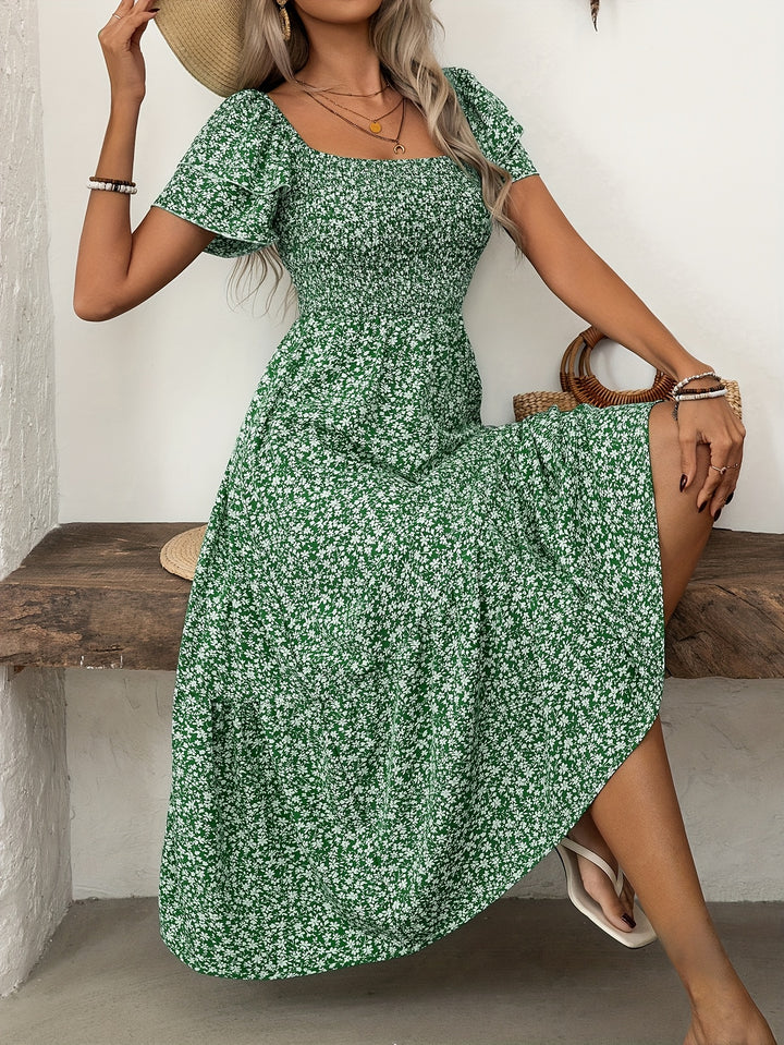 Florine | Midi-jurk met bloemenprint en rucherand